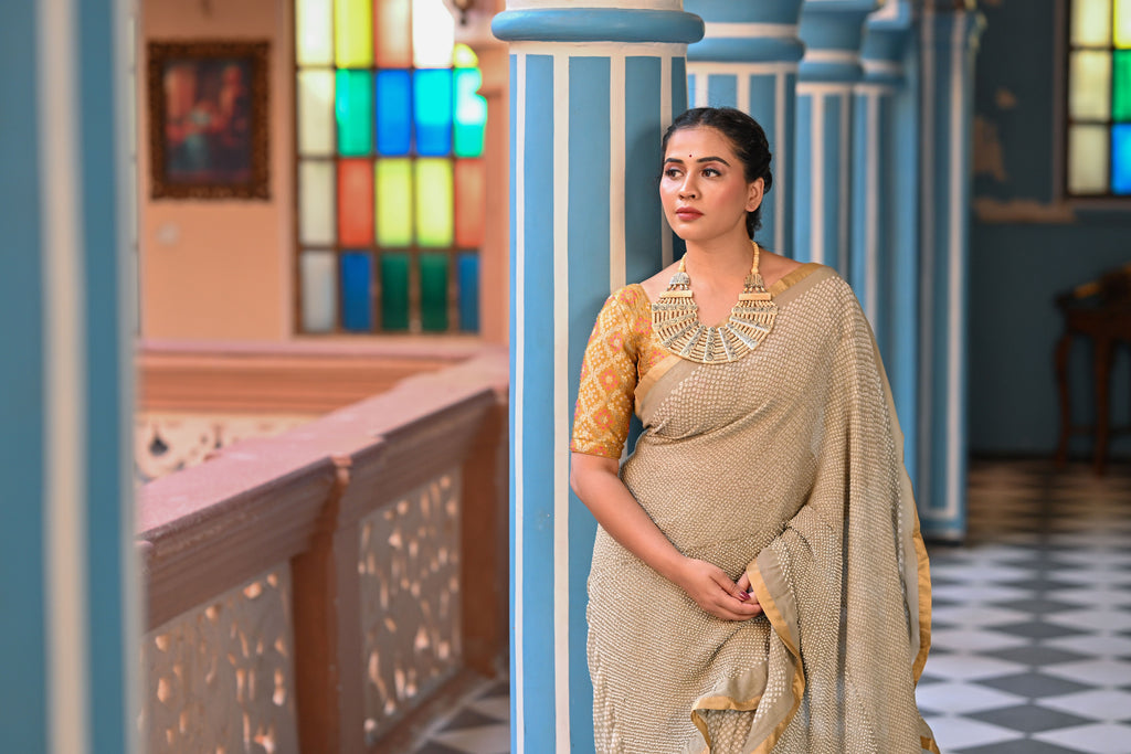 BEIGE ETERNAL DOT BANDHANI GEORGETTE SAREE WITH SILK BORDER