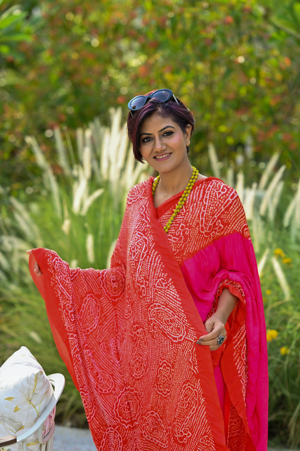 PINK-ORANGE YIN-YANG HALF FULL HALF EMPTY PAISLEY BANDHANI SILK SAREE