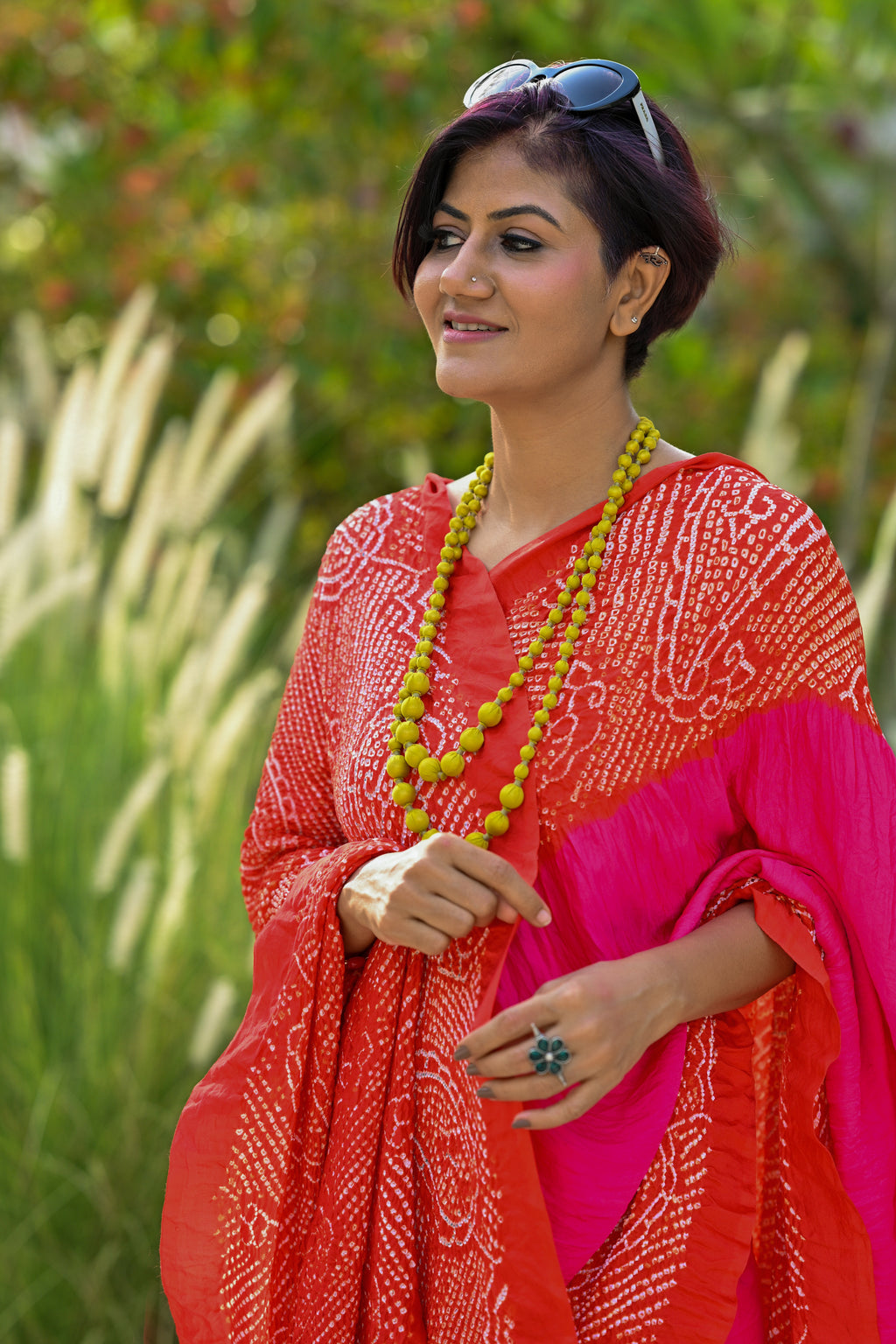 PINK-ORANGE YIN-YANG HALF FULL HALF EMPTY PAISLEY BANDHANI SILK SAREE
