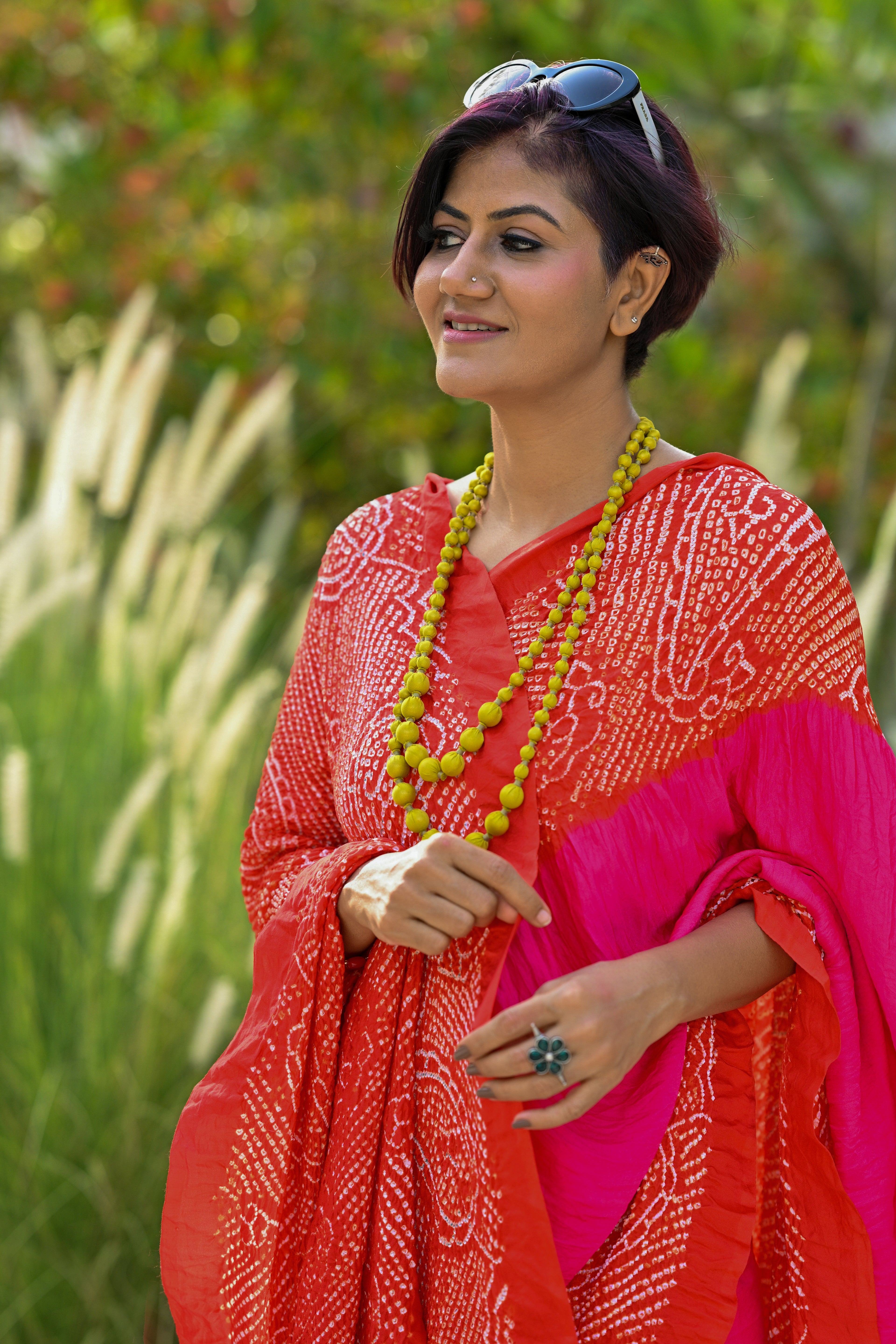 PINK-ORANGE YIN-YANG HALF FULL HALF EMPTY PAISLEY BANDHANI SILK SAREE