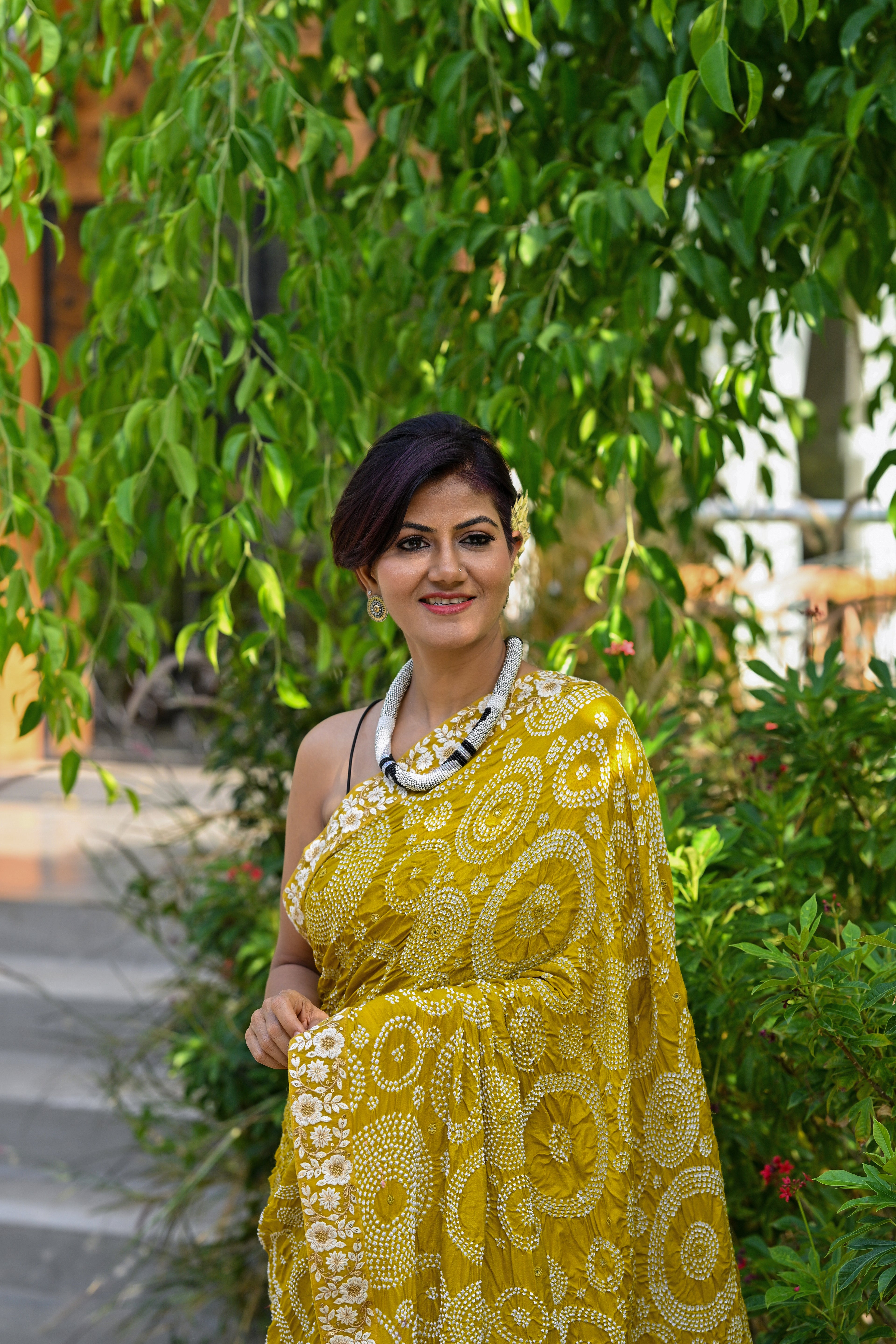 MUSTARD YELLOW CIRCLES OF THE LIFE BANDHANI SILK SAREE WITH MIRROR WORK AND LACE BORDER