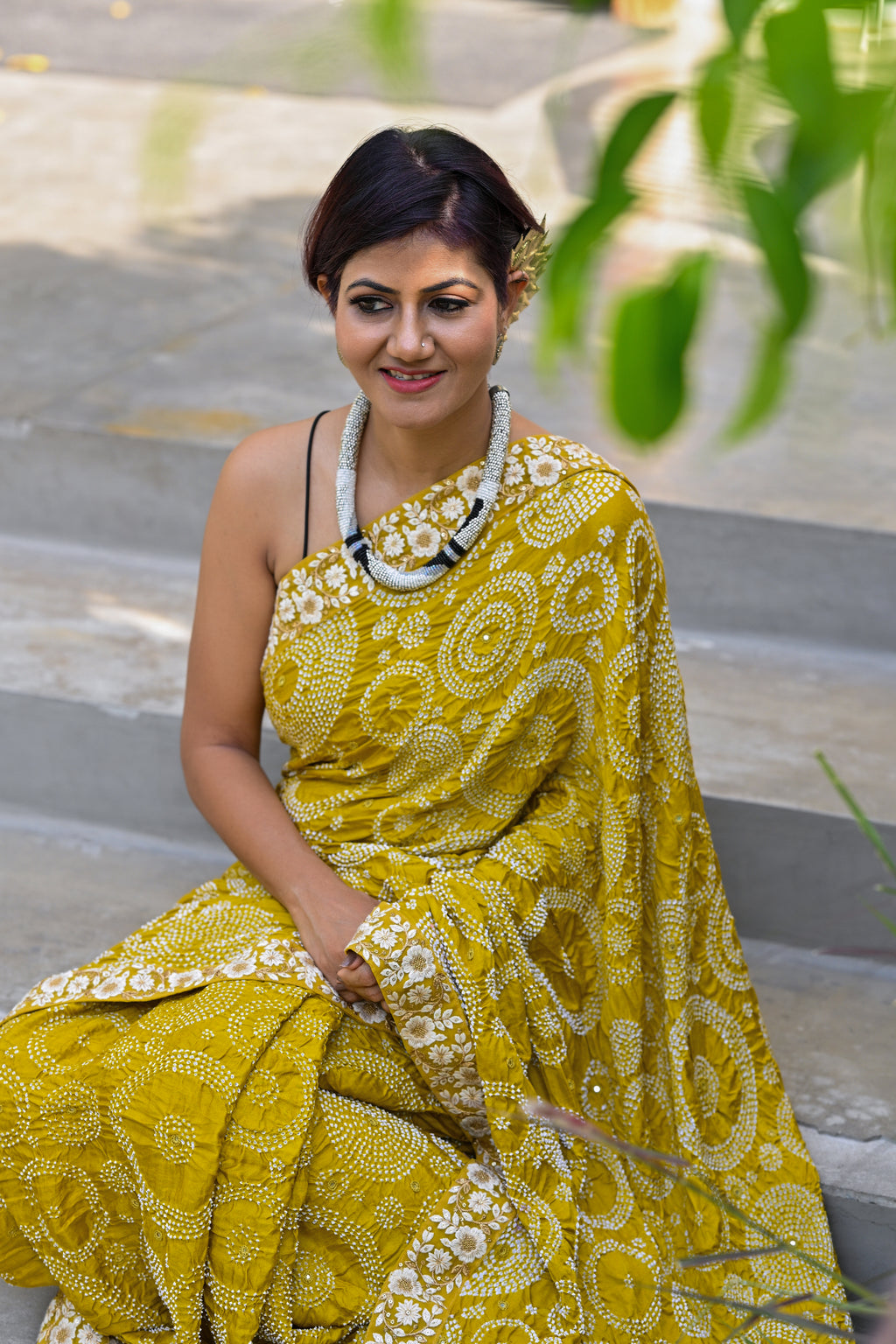 MUSTARD YELLOW CIRCLES OF THE LIFE BANDHANI SILK SAREE WITH MIRROR WORK AND LACE BORDER