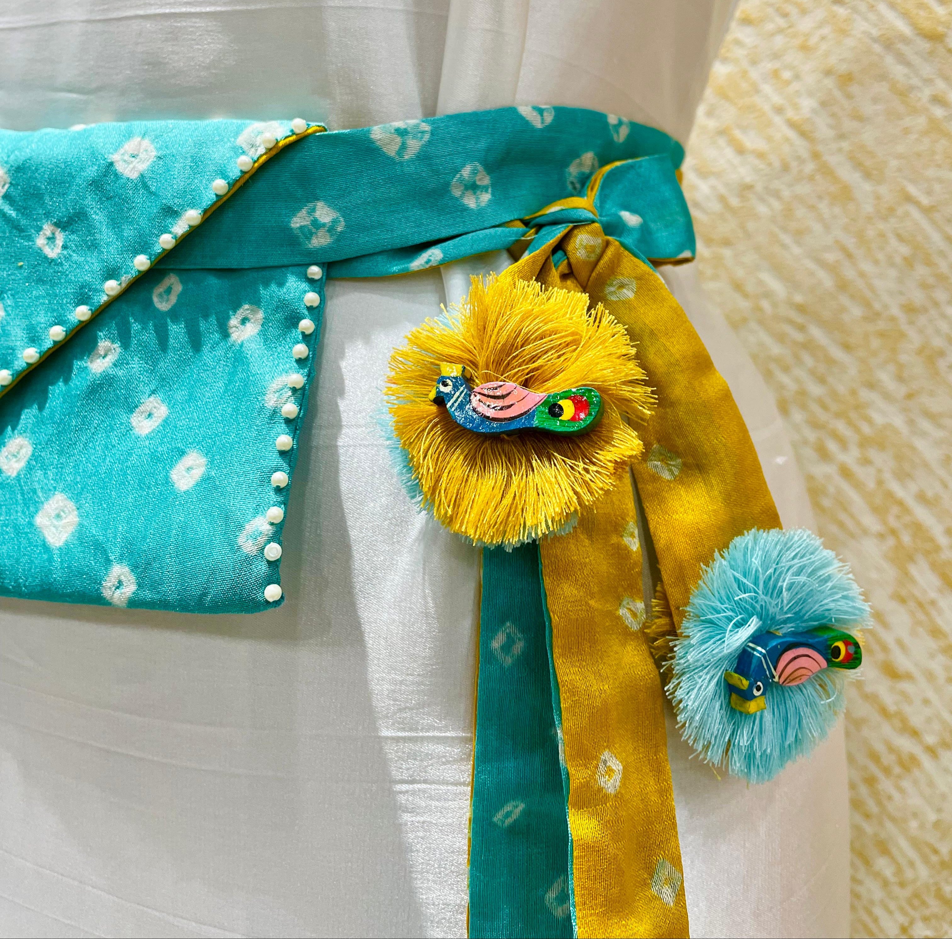 LIGHT BLUE - YELLOW SILK WAIST BAG WITH HANDMADE TASSELS AND STONEWORK