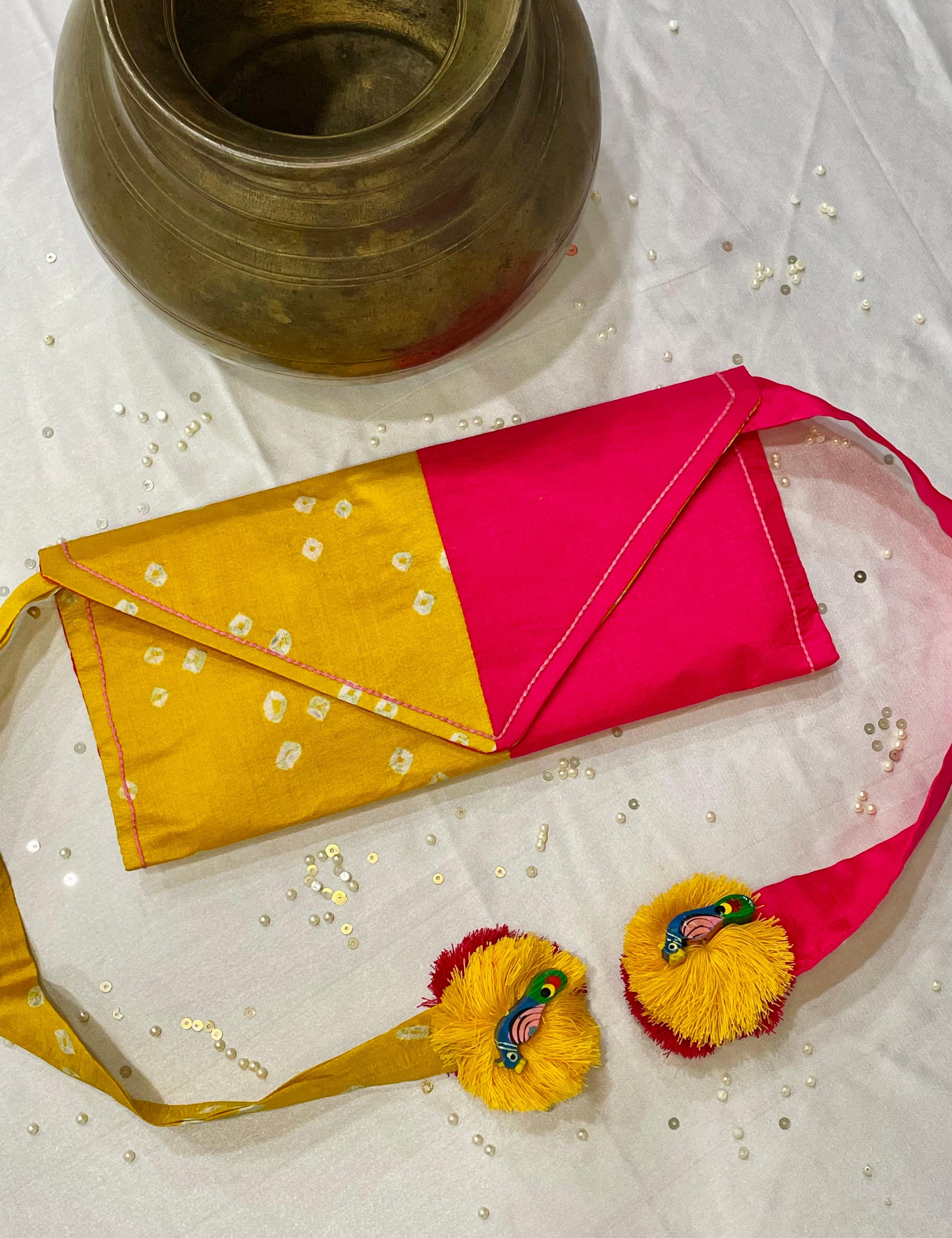 YELLOW-PINK SILK WAIST BAG WITH HANDMADE TASSELS