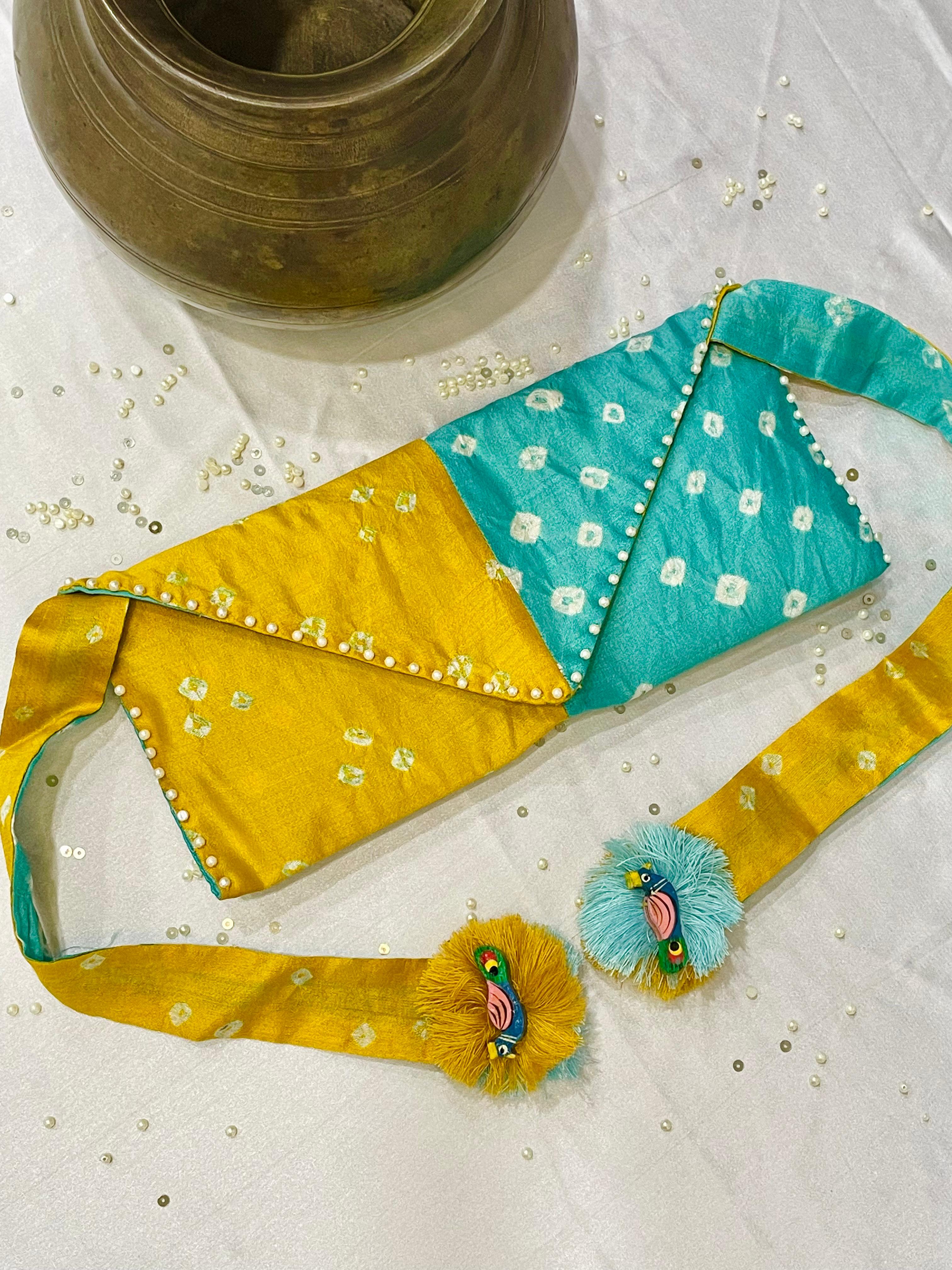 LIGHT BLUE - YELLOW SILK WAIST BAG WITH HANDMADE TASSELS AND STONEWORK