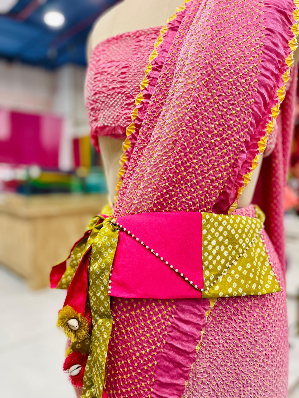 YELLOW-PINK SILK WAIST BAG WITH HANDMADE TASSELS AND STONEWORK