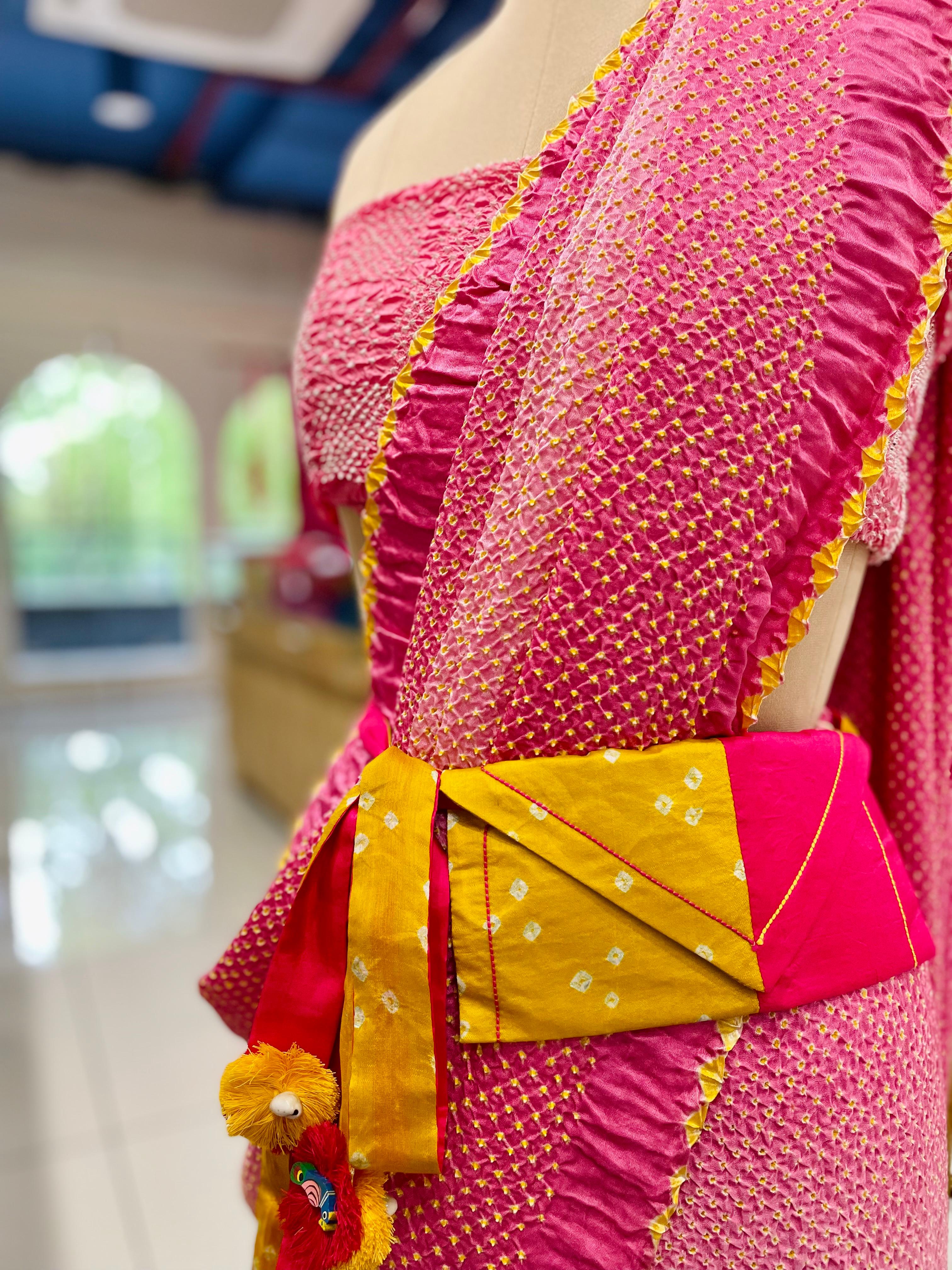 YELLOW-PINK SILK WAIST BAG WITH HANDMADE TASSELS