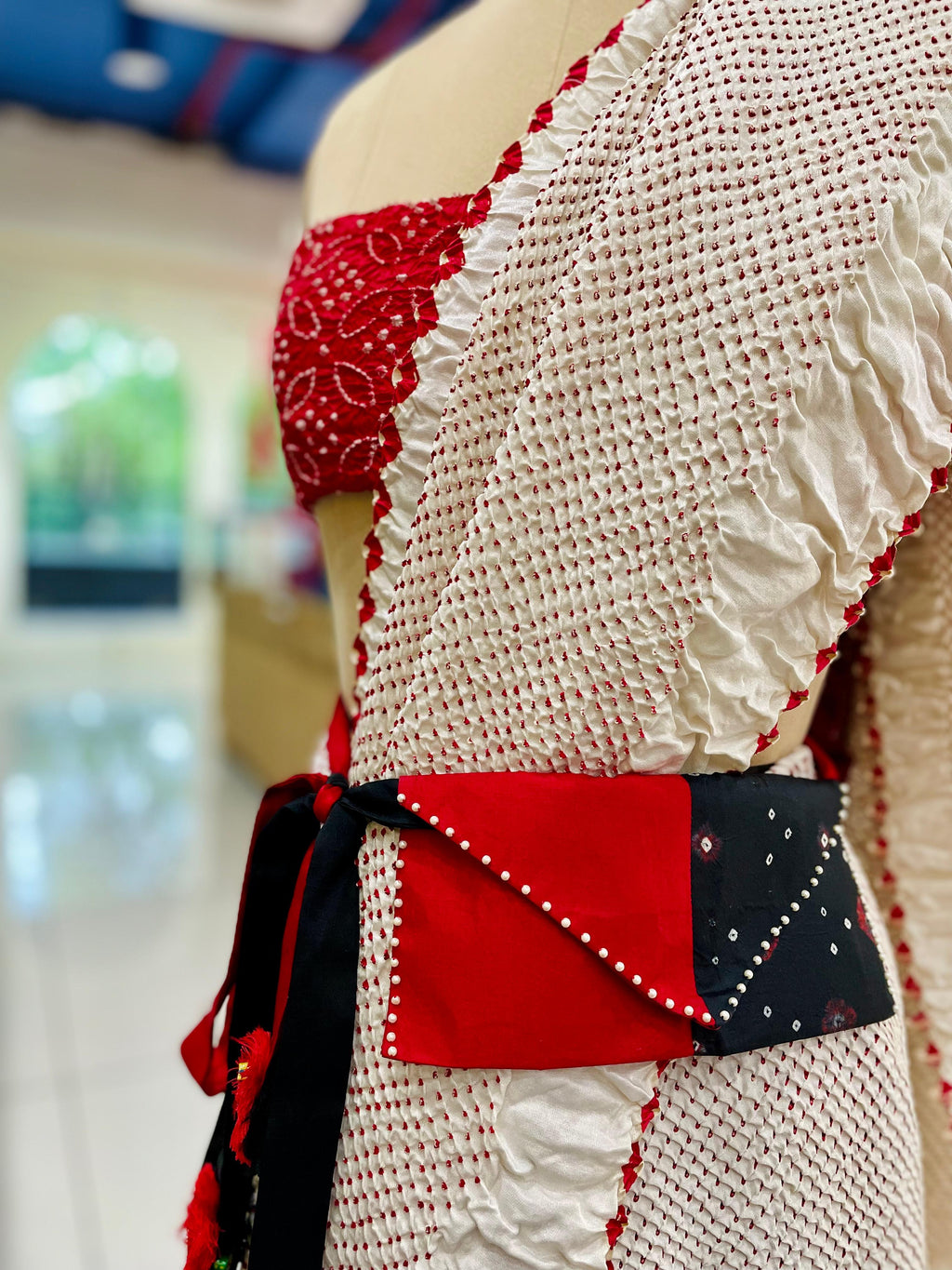 RED-BLACK SILK WAIST BAG WITH HANDMADE TASSELS AND STONEWORK